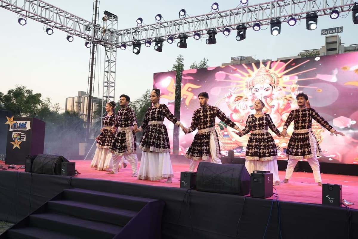 Traditional dance performance on stage at a corporate celebration