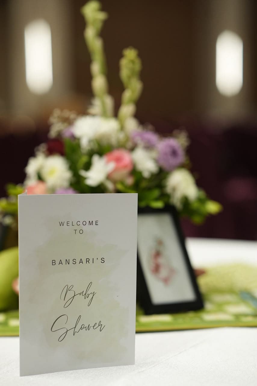 Welcome signage and floral styling for Bansari's baby shower